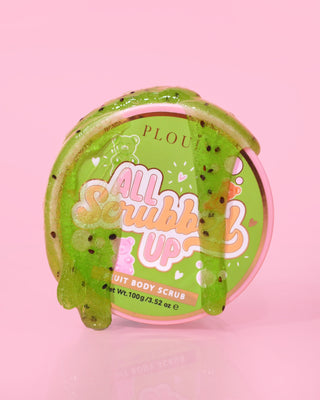 A container of P.Louise All Scrubbed Up Body Scrub with the label 'Candy Bears' on a pink background, with the product appearing as a green gel