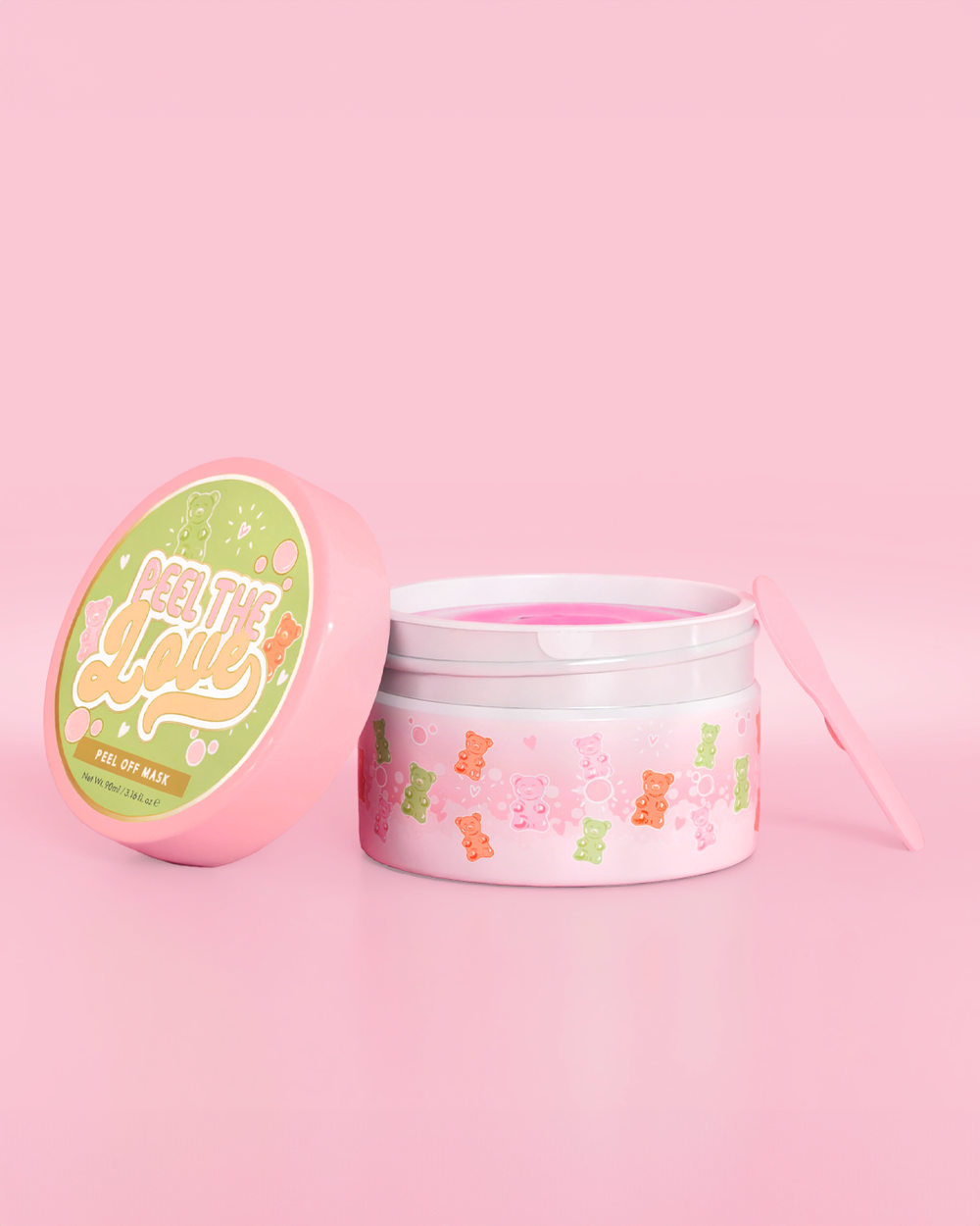 Pink container with candy bear design on a pink background
