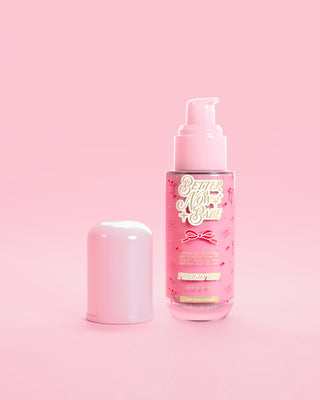 A pink P.Louise bottle of Better Now Babe Pink Barrier Repair Serum in Twilight Tide scent with pump and cap on a pink background