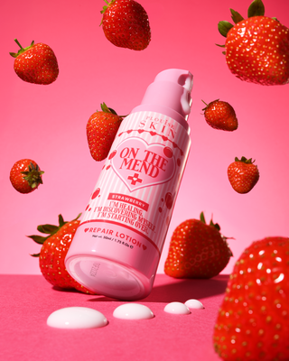 Pink bottle of P.Louise On The Mend Barrier Repair Lotion in strawberry